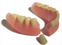 Reparationer af tandprotese og implantater